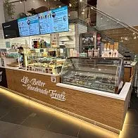 Производство барной стойки и нестандартной мебели для кафе-пекарни Cinnabon в ТРК Мозаика
