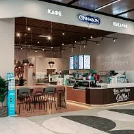 Барная стойка и мебель для кафе-пекарни Cinnabon в ТРЦ Экопарк в Санкт-Петербурге